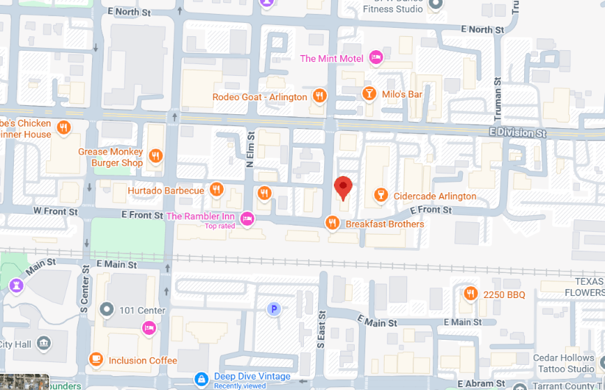 Map showing streets and businesses in Arlington, Texas, with a highlighted location.